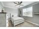 This cozy bedroom is brightened by a large window and includes a plush carpet at 6276 Artigas Dr, Fort Mill, SC 29707