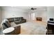 Spacious bonus room featuring cozy seating, perfect for entertaining, and plenty of space for a home theater setup at 6276 Artigas Dr, Fort Mill, SC 29707
