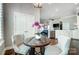 This lovely dining area showcases stylish decor and connects seamlessly to the adjacent living spaces at 6276 Artigas Dr, Fort Mill, SC 29707