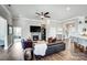 Inviting living room with a cozy fireplace, hardwood floors, and plenty of seating for entertaining at 6276 Artigas Dr, Fort Mill, SC 29707