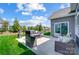 Outdoor patio with grill and seating area, ideal for entertaining and enjoying the backyard at 6276 Artigas Dr, Fort Mill, SC 29707