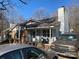 Inviting home exterior with a cozy front porch, a well-manicured lawn, and ample parking space in the driveway at 6536 Pineburr Rd, Charlotte, NC 28211