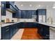 Well-appointed kitchen featuring stainless steel appliances, white countertops and ample cabinet space at 7322 Bay Ridge Dr, Denver, NC 28037
