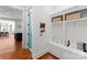 Well-organized mudroom with built-in storage, a bench, and decorative accents providing an organized entrance at 7322 Bay Ridge Dr, Denver, NC 28037