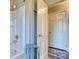 Bathroom featuring a shower/tub combination and door at 842 Mary Knoll Ct, Rock Hill, SC 29730