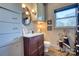 Charming bathroom with a sink, toilet, mirror, and window at 842 Mary Knoll Ct, Rock Hill, SC 29730