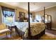 Beautiful bedroom with four poster bed, side tables, and lamps at 842 Mary Knoll Ct, Rock Hill, SC 29730