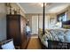 Well-lit bedroom featuring classic wood furniture, hardwood floors, and neutral color palette at 842 Mary Knoll Ct, Rock Hill, SC 29730