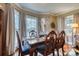 Formal dining room with natural light from the bay window and hardwood floors at 842 Mary Knoll Ct, Rock Hill, SC 29730