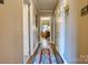 Hallway with hardwood floors and view of a sitting room at 842 Mary Knoll Ct, Rock Hill, SC 29730