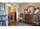 Hallway featuring hardwood floors and a view into a bright office space at 842 Mary Knoll Ct, Rock Hill, SC 29730