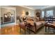 Living room with a fireplace, hardwood floors, and large sofa at 842 Mary Knoll Ct, Rock Hill, SC 29730