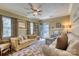 Comfortable living room features ample seating, natural light from surrounding windows and traditional décor at 842 Mary Knoll Ct, Rock Hill, SC 29730