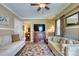 Bright living room with comfortable sofas, television, and a patterned area rug at 842 Mary Knoll Ct, Rock Hill, SC 29730