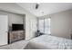 Bedroom featuring a ceiling fan, and built in shelving at 9068 Cinnabay Dr, Charlotte, NC 28216