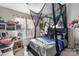 Bedroom featuring a window with privacy curtains and desk space at 9068 Cinnabay Dr, Charlotte, NC 28216