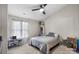 Bedroom featuring a ceiling fan, window, and closet at 9068 Cinnabay Dr, Charlotte, NC 28216