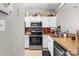 Kitchen features stainless steel appliances, neutral cabinets, and granite countertops at 9068 Cinnabay Dr, Charlotte, NC 28216