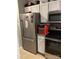 Modern kitchen with stainless steel appliances, white cabinets, and ample counter space for cooking at 9068 Cinnabay Dr, Charlotte, NC 28216