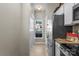 Bright kitchen area featuring stainless steel appliances and tile floors at 9068 Cinnabay Dr, Charlotte, NC 28216