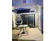 Cozy outdoor patio with seating, umbrella, and sliding door, perfect for relaxing and entertaining at 9068 Cinnabay Dr, Charlotte, NC 28216