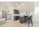 Upstairs bar area with granite counters and bar stool seating at 913 Dacavin Dr, Charlotte, NC 28226