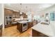 Spacious kitchen with custom cabinets, granite countertops, and stainless steel appliances at 913 Dacavin Dr, Charlotte, NC 28226