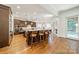 Gourmet kitchen with large island, stainless steel appliances, and hardwood floors at 913 Dacavin Dr, Charlotte, NC 28226