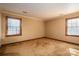 Bedroom featuring two windows, neutral paint, and carpet flooring at 1008 High Wedge Rd, Shelby, NC 28152