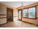 Cozy breakfast nook featuring tile floors, large windows, and outdoor access at 1008 High Wedge Rd, Shelby, NC 28152