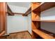 Walk-in closet with built-in shelving for optimal organization and storage at 1008 High Wedge Rd, Shelby, NC 28152