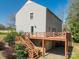 Side exterior view of home, showcasing deck, siding, and garage at 1008 High Wedge Rd, Shelby, NC 28152