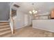 Open-concept dining area leads to the kitchen and main living spaces at 1026 Eagles Nest Ln, Fort Mill, SC 29707