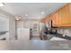 Efficient kitchen layout featuring stainless appliances and ample counter space at 1026 Eagles Nest Ln, Fort Mill, SC 29707