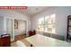 Bright home office with French doors, a large window, and neutral decor at 105 Windstone Common Ln, Mooresville, NC 28117