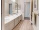 Bathroom featuring a double vanity sink, tiled floor, and large mirror at 116 Jonas Dr, Lincolnton, NC 28092