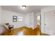 Clean and minimalist bedroom with hardwood floors and built-in shelving at 116 Jonas Dr, Lincolnton, NC 28092
