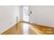 Bonus room with bright, natural light coming in through large rear door at 116 Jonas Dr, Lincolnton, NC 28092