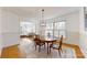 Dining room with wood table and chairs; open to living room at 116 Jonas Dr, Lincolnton, NC 28092