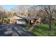 Ranch home with a brick exterior, attached garage and a driveway at 116 Jonas Dr, Lincolnton, NC 28092