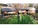 Charming brick home featuring manicured lawn and beautifully landscaped front yard at 116 Jonas Dr, Lincolnton, NC 28092