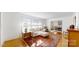 Sun-filled living room with hardwood floors and large windows at 116 Jonas Dr, Lincolnton, NC 28092