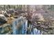 The property has a running stream in the backyard, surrounded by nature at 116 Jonas Dr, Lincolnton, NC 28092
