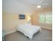 Cozy bedroom featuring vaulted ceilings, soft lighting, and a ceiling fan at 124 Gatlin Knl # 11, New London, NC 28127