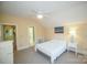 Inviting bedroom boasts a ceiling fan, natural light, and neutral tones at 124 Gatlin Knl # 11, New London, NC 28127