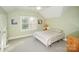 Comfortable bedroom with neutral carpet, ample natural light, and charming decor at 124 Gatlin Knl # 11, New London, NC 28127