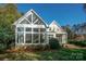 Stunning home featuring large sunroom, second story deck, and mature landscaping at 124 Gatlin Knl # 11, New London, NC 28127