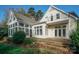 Beautiful home featuring a sunroom, second story patio, and brick walkway at 124 Gatlin Knl # 11, New London, NC 28127