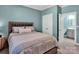 Comfortable bedroom with a plush bed, neutral decor, and en-suite bathroom at 1501 Allegheny Way, Waxhaw, NC 28173
