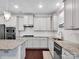 Kitchen features white cabinets, subway tile backsplash, and stainless steel appliances at 1501 Allegheny Way, Waxhaw, NC 28173